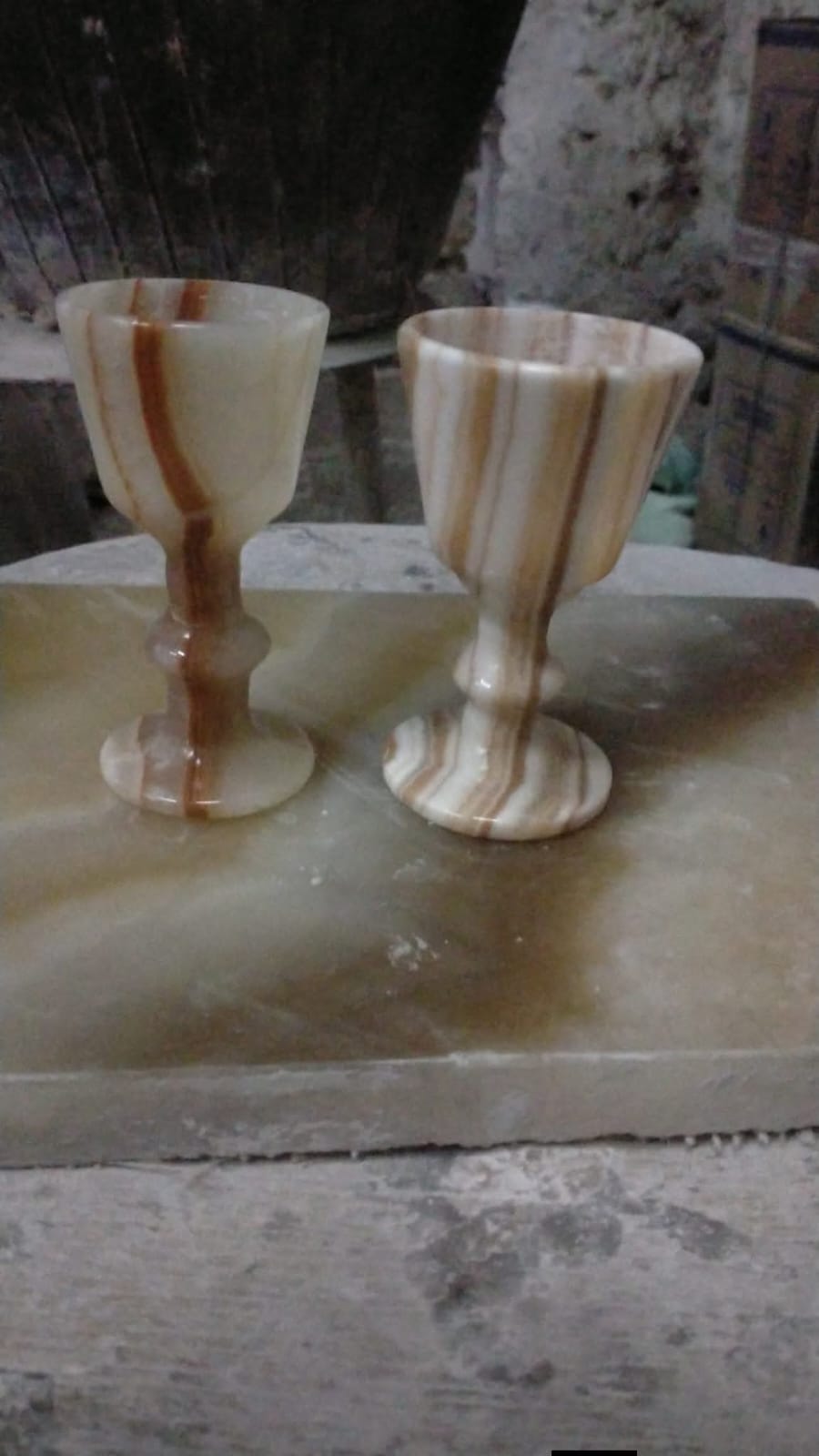 Product Details: Handcrafted Excellence: Sculpted meticulously by master Egyptian artisans from natural warm beige and amber-veined onyx.